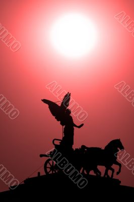 A statue in silhouette