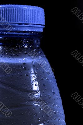Water bottle against black