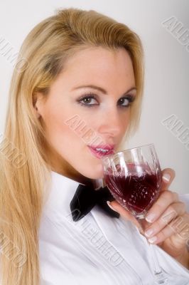 woman sipping wine