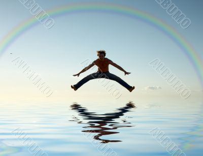 jump over water under rainbow