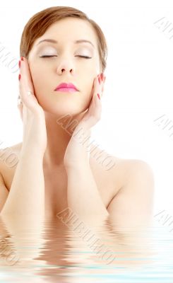lovely woman washing face