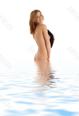 girl with hat in water