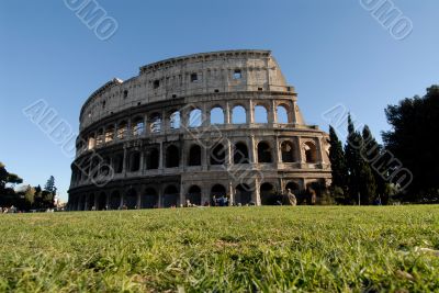 Colosseum and green lawn