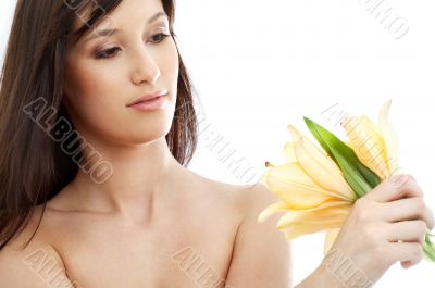 happy brunette with yellow lily flowers #2