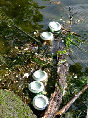 Cans In Water