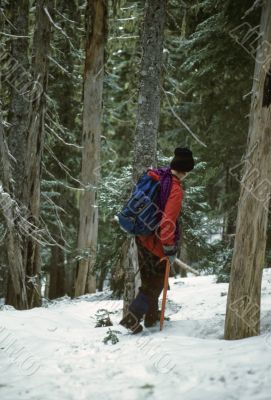 Climber descending spring snow