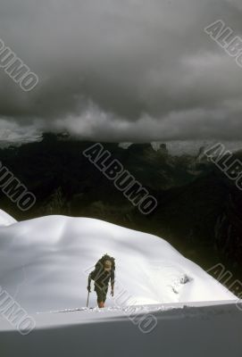 Climber ascending snowfield