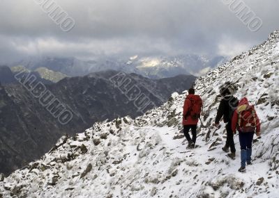 Hikers in new snow