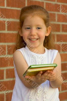 girl offers book