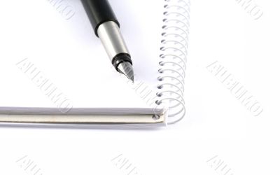 Business concepts - notebook and pen