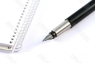 Business concepts - notebook and pen