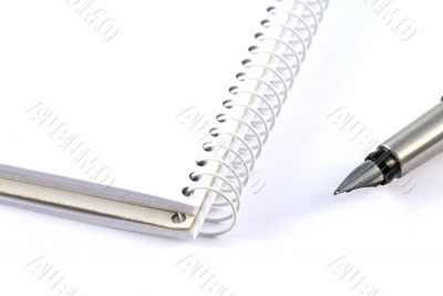 Business concepts - notebook and pen