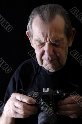 Senior with camera