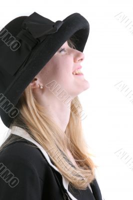 pretty young lady in hat taking sun