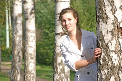The girl behind a birch
