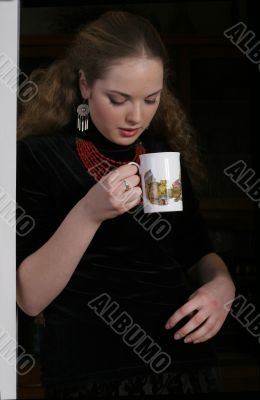 pretty drinking tea