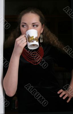 pretty young lady drinking