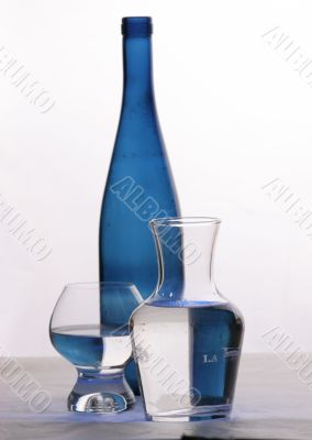 blue bottle and glasses