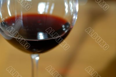 A glass of red wine.-