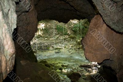Grotto in the waterfall
