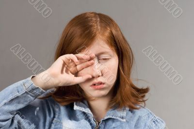 rubbing eyes