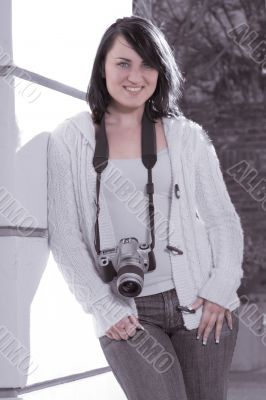 Girl with SLR photo camera