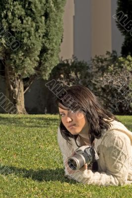 Girl with SLR photo camera
