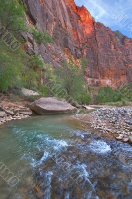 Fine small river between red rocks