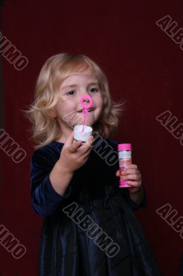 happy little girl in party dress