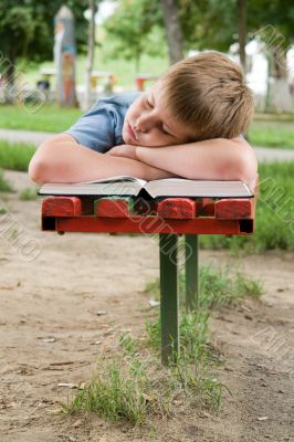 schoolboy sleeps