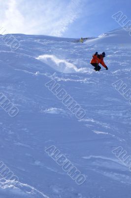 Red skier in powder snow,