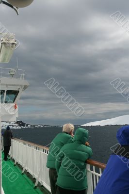 Cruise ship tourists looking at glaciers