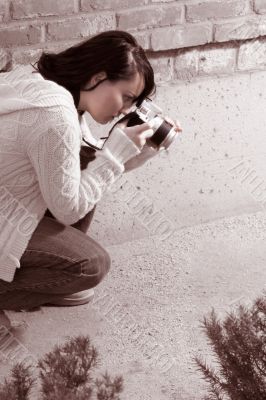 Girl with SLR photo camera