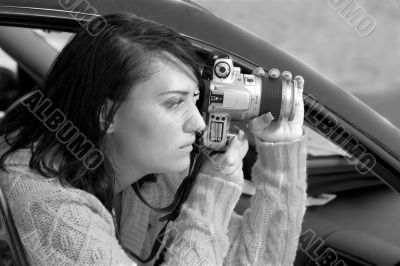 Girl with SLR photo camera