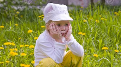 The girl and dandelions