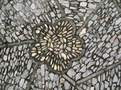 Stone road closeup with flower pattern