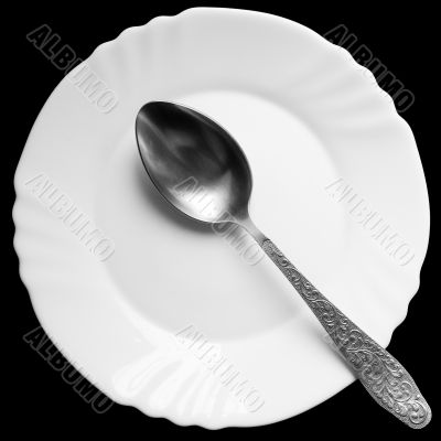 spoon on a white plate