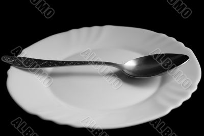 spoon on a white plate