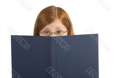 Behind book