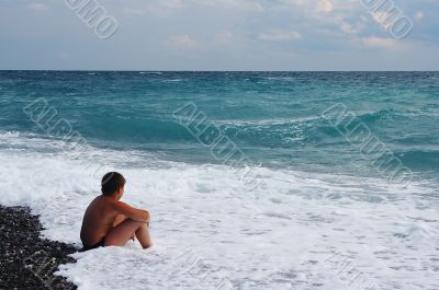 Boy looking at sea