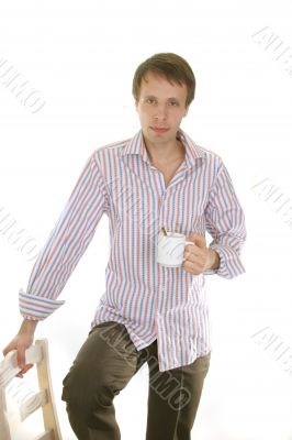 young  man with tea cup