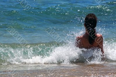The girl has a rest on a beach