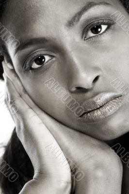 Model with hands near her head