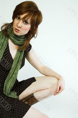 Green dress on the edge of the frame