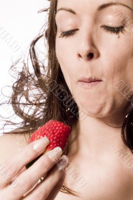 Eating a strawberry