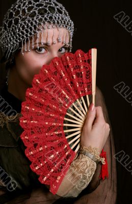Decadanse with a red fan