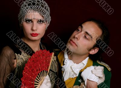 Men and girl in mascarade dresses