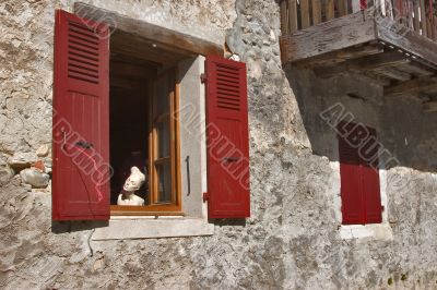 Dummy in a red window.