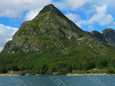 Triangular hill on coast of Gjende lake