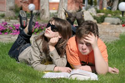 boy and girl with a book